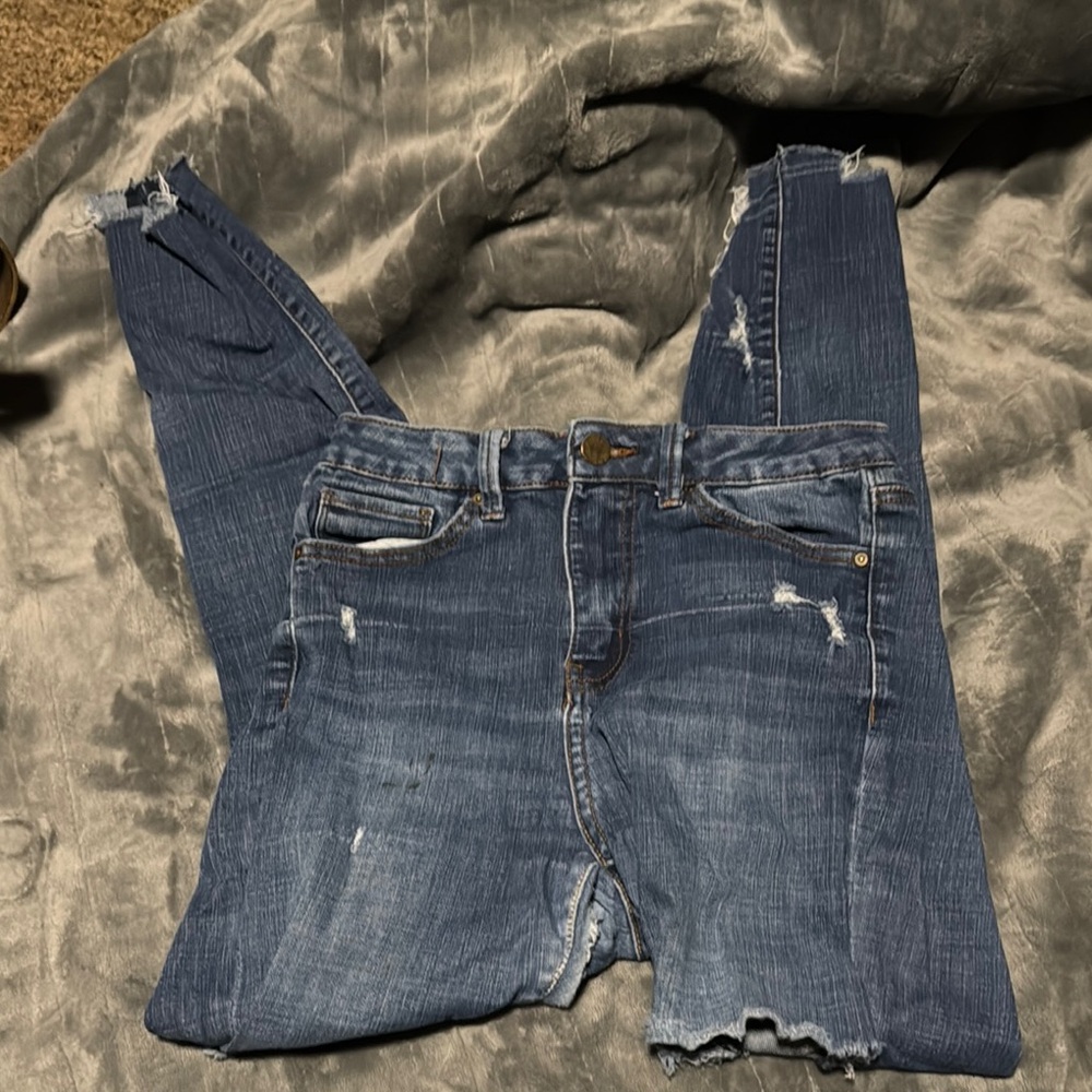 Blue Skinny Jeans with Distressed Details